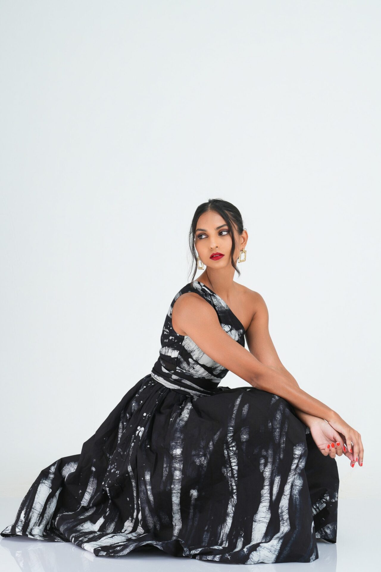 Myla Flared One Shoulder Midi Dress in Black